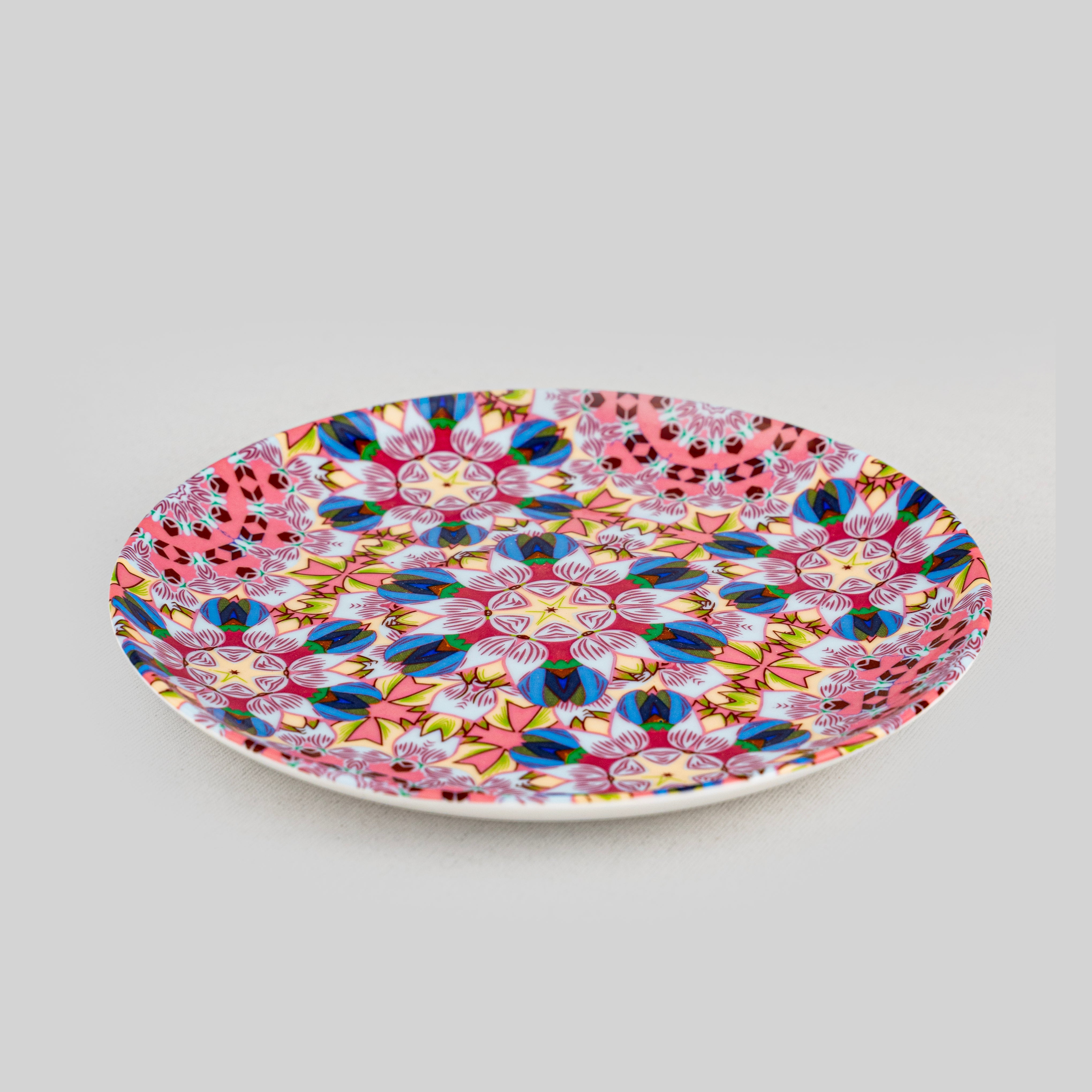 Cosmic Print porcelain dessert plates styled on a
dining table bold designer tableware by tyetye india