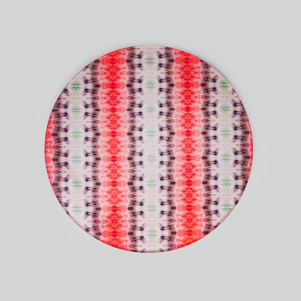 Stylish ikat trivet adding a bohemian touch to a kitchen table.