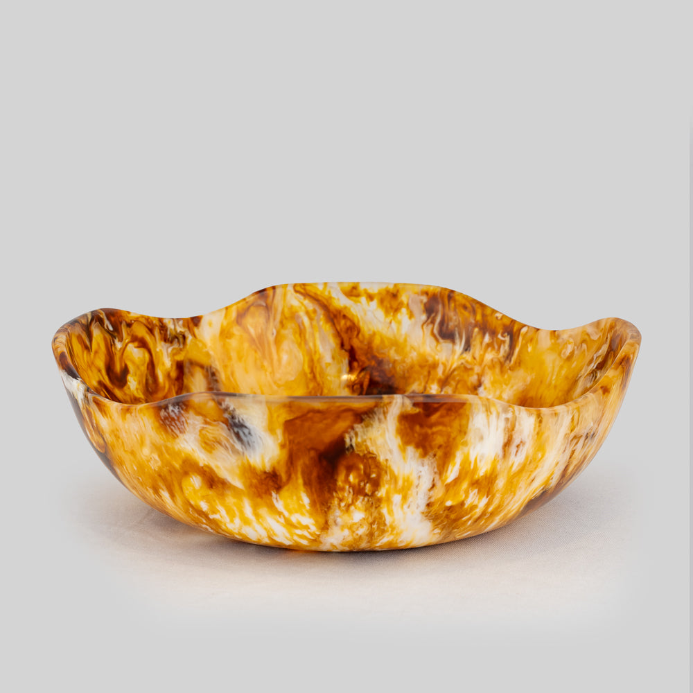 Stylish resin bowl with earthy swirl design for table setting