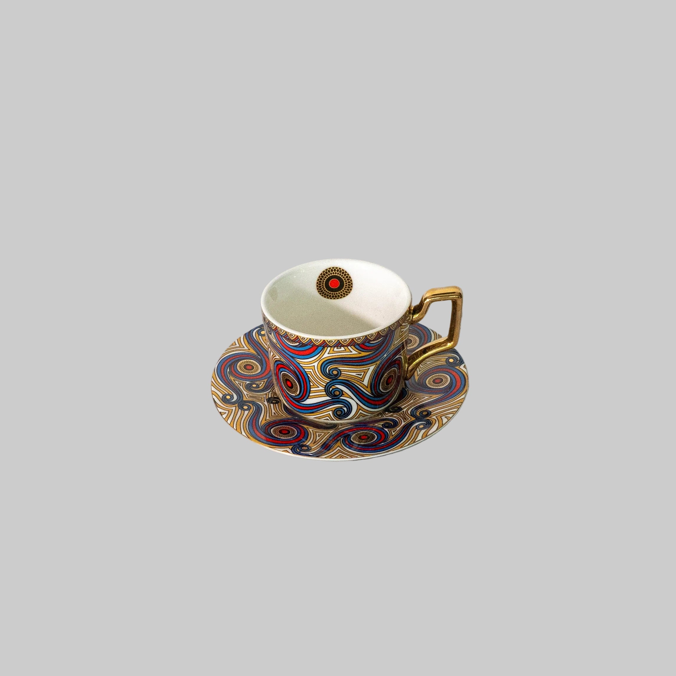 Stylish table setting featuring a mosaic tea and coffee set, perfect for entertaining guests."