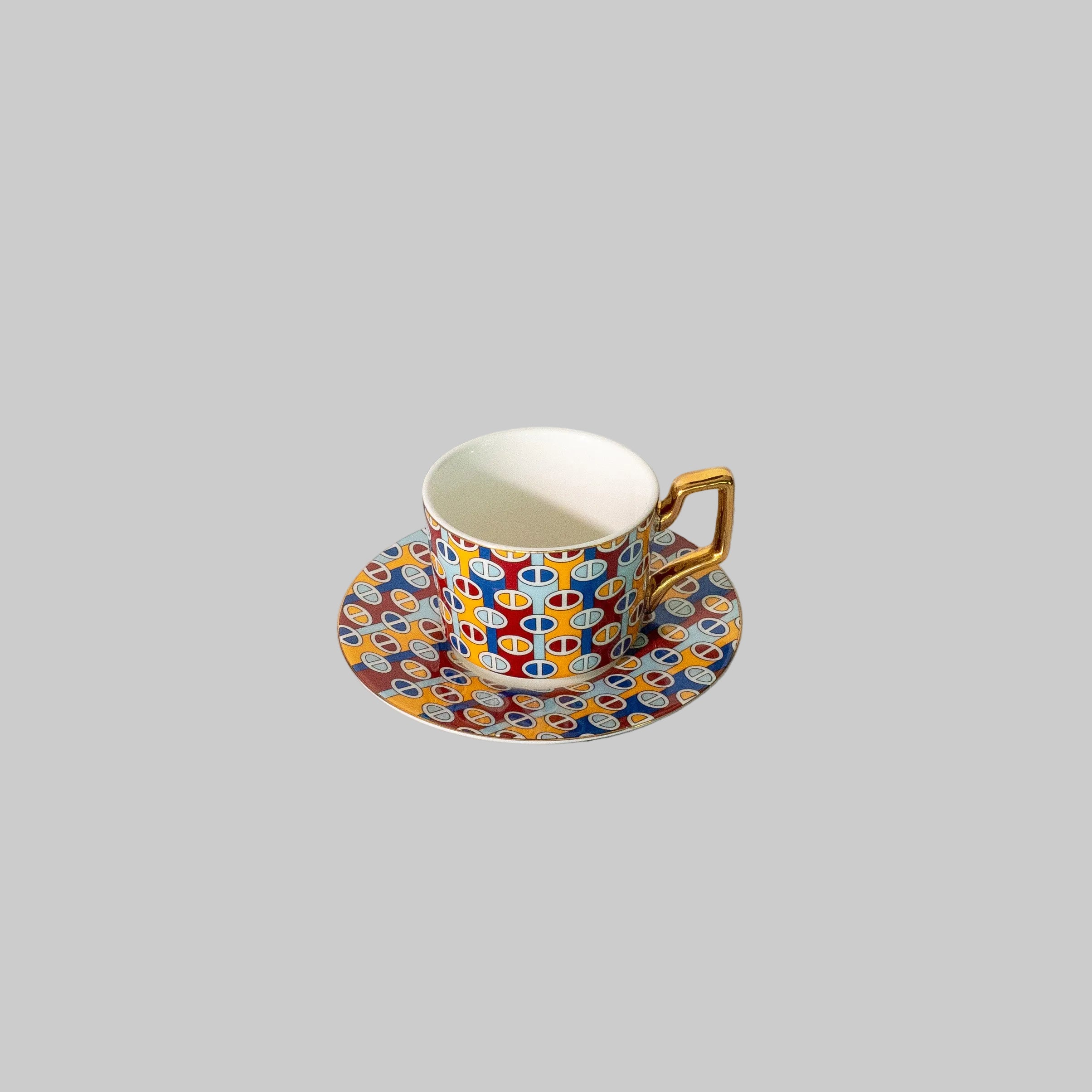 "Guests enjoying tea served in a stunning mosaic tea set, enhancing the atmosphere of the gathering."