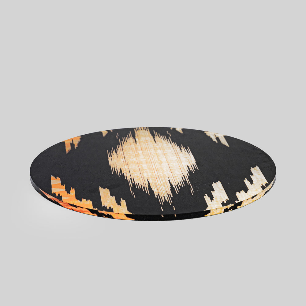 Contemporary acrylic trivet with ebony pattern for dining table decor
