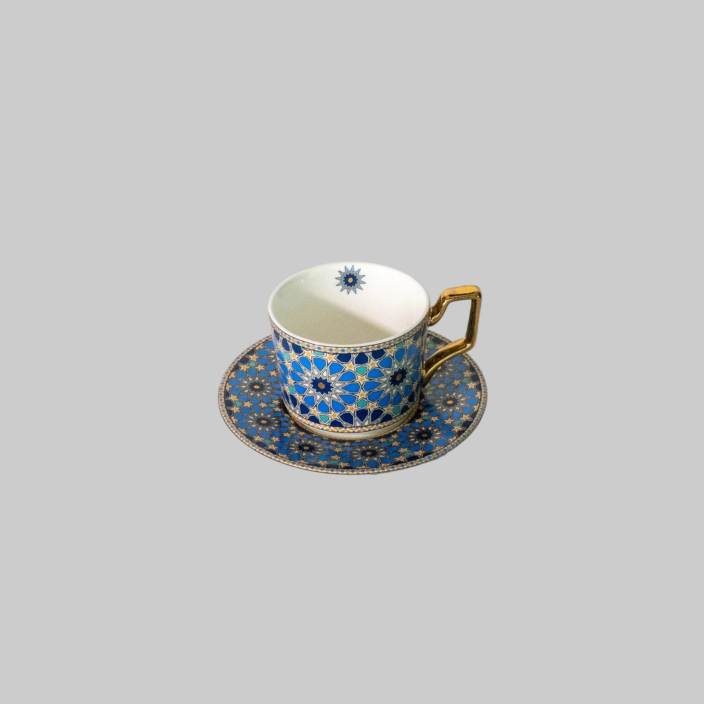 "Close-up of a colorful mosaic coffee cup with unique geometric patterns."