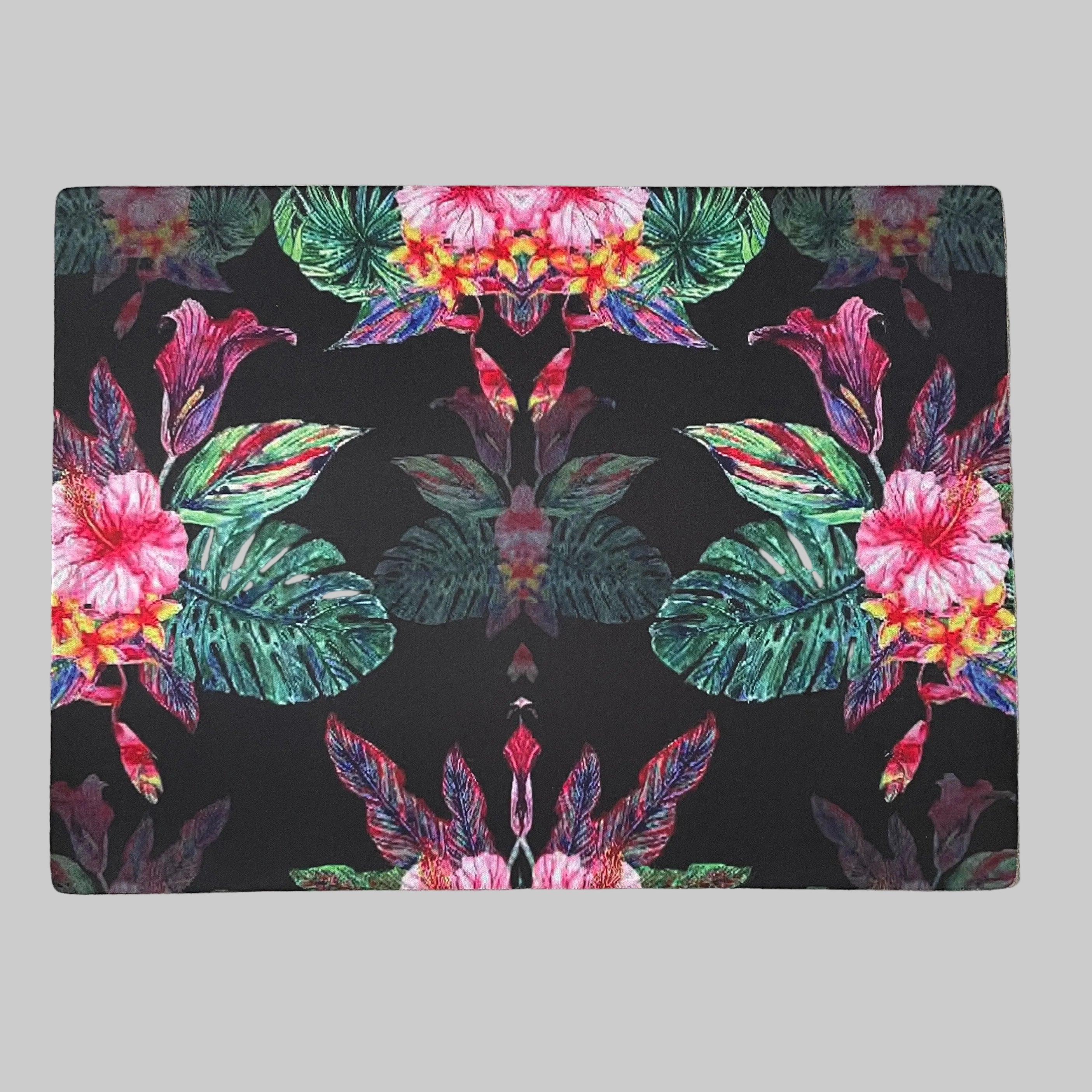 "Elegant dining table set with Camellia Bloom placemats, enhancing the floral theme of the decor."

