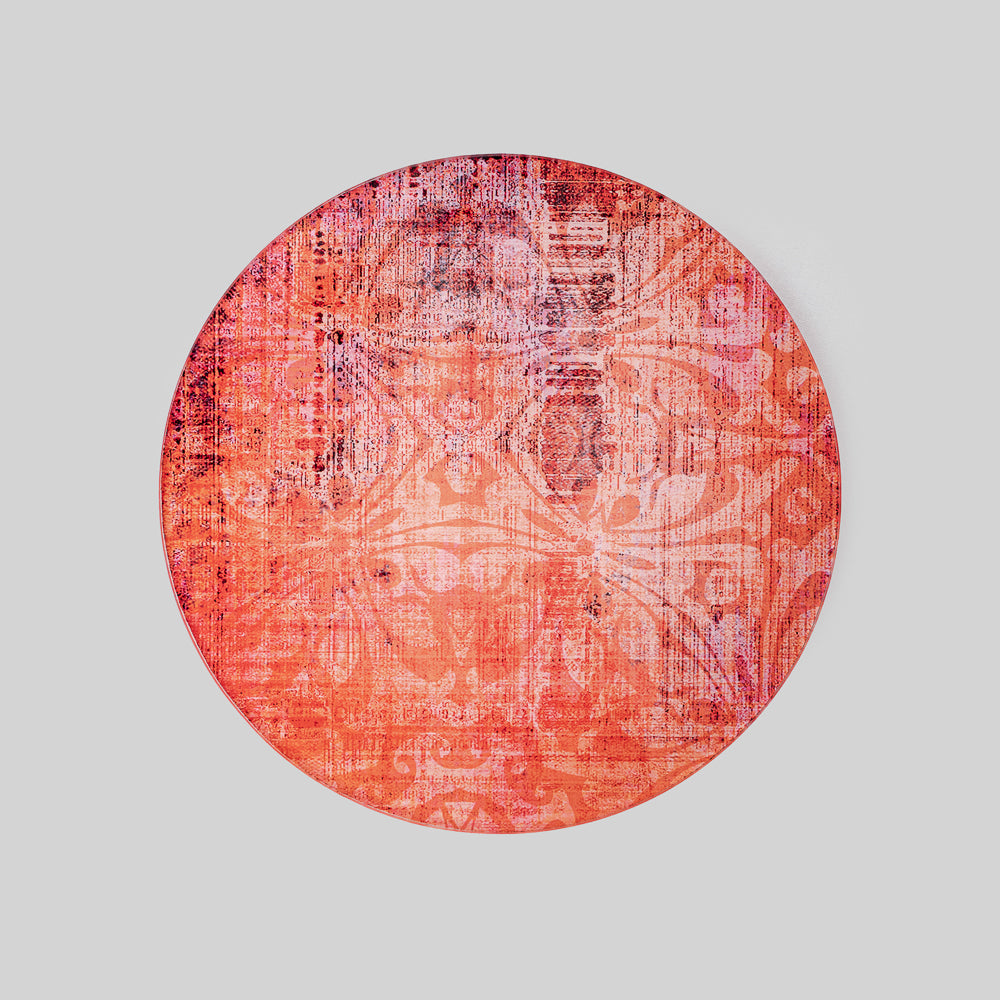 Sunshine print trivet displaying a vibrant pattern under a hot pot