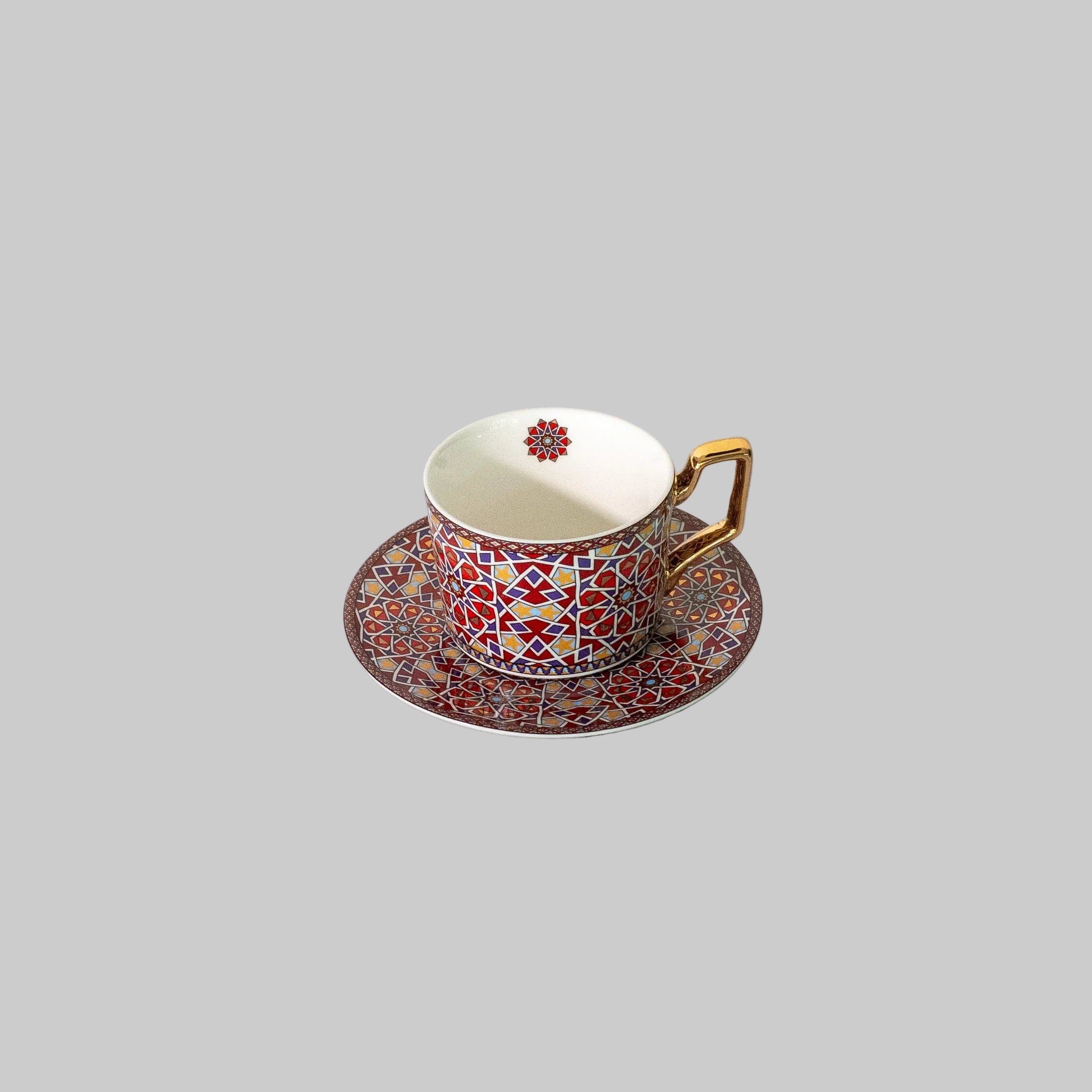 Close-up of a colorful mosaic coffee cup with unique geometric patterns."

