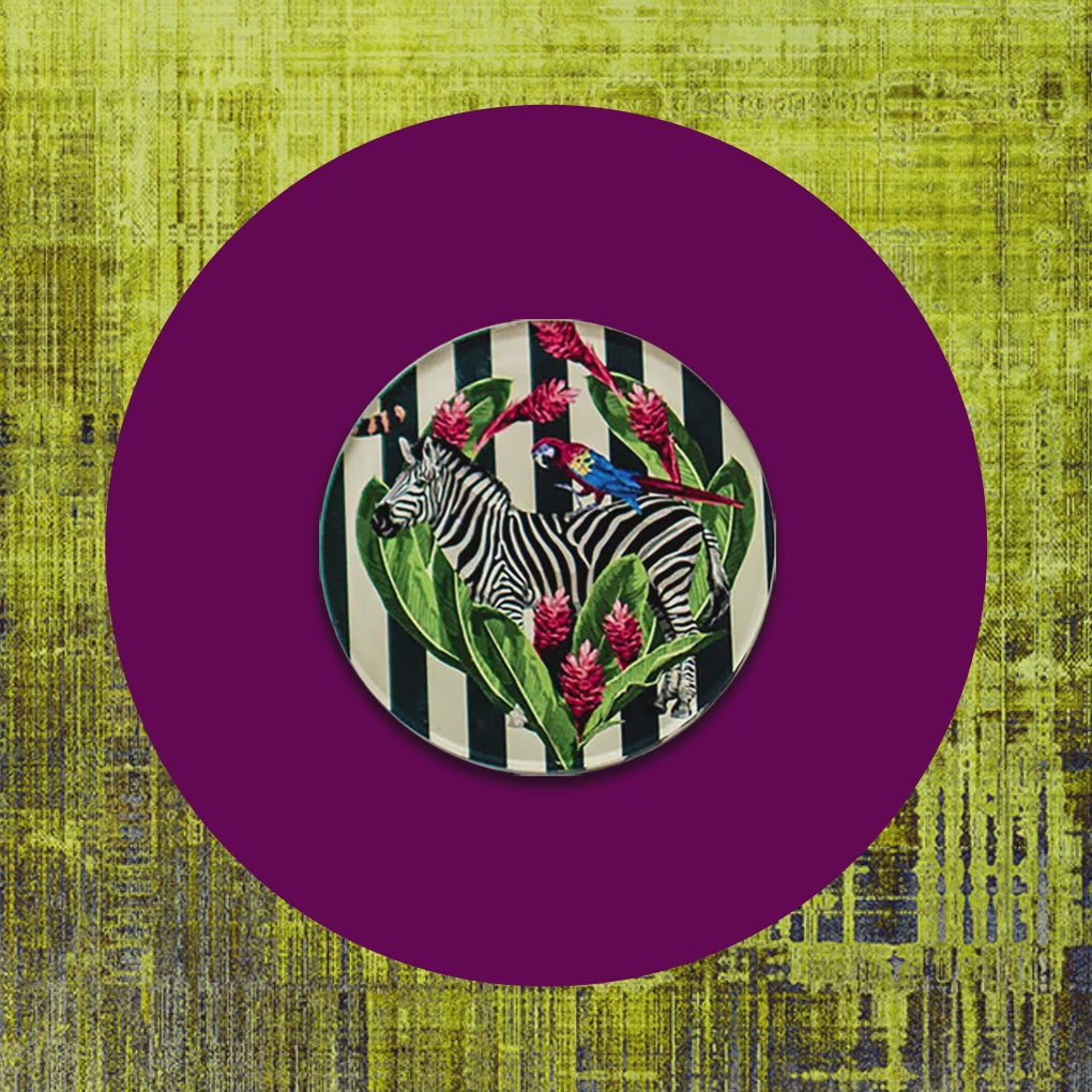 "A video showcasing a set of jungle-themed acrylic coasters, featuring vibrant tropical designs with leaves and animals, as they are arranged and highlighted against a neutral background."